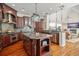 Gourmet kitchen featuring granite countertops, ample cabinetry, and island at 9011 Pinnacle Cir, Windermere, FL 34786