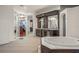 Bathroom featuring a large soaking tub, double vanities and walk-in closet at 9011 Pinnacle Cir, Windermere, FL 34786