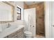 Bathroom with shower, toilet, vanity, and a window at 9011 Pinnacle Cir, Windermere, FL 34786
