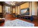 Home theater room showcasing a large screen TV and comfortable seating at 9011 Pinnacle Cir, Windermere, FL 34786