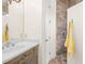 Bathroom with a walk-in shower and updated vanity at 9011 Pinnacle Cir, Windermere, FL 34786