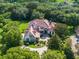 Luxury estate home on a large lot with mature trees at 9011 Pinnacle Cir, Windermere, FL 34786