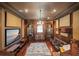 Elegant home theater with built-in cabinetry and large screen at 9011 Pinnacle Cir, Windermere, FL 34786