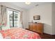 Bedroom with a comfortable bed and plenty of natural light at 9011 Pinnacle Cir, Windermere, FL 34786