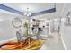 Modern dining area with glass table and four chairs at 13427 Blue Heron Beach Dr # 405, Orlando, FL 32821