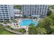 Resort-style pool with surrounding lounge area at 13427 Blue Heron Beach Dr # 405, Orlando, FL 32821