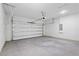Spacious garage with white walls and concrete floor at 5277 Sw 165Th Street Rd, Ocala, FL 34473