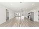 Open concept kitchen with island and stainless steel appliances at 5277 Sw 165Th Street Rd, Ocala, FL 34473