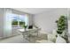 Bright home office features a desk, chairs, and large window at 3901 Botancial Court, Sanford, FL 32773