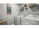 Laundry room with washer, dryer, and shelving at 3901 Botancial Court, Sanford, FL 32773