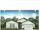 New construction home with two-car garage and front yard at 30808 Apricot Ave, Eustis, FL 32736