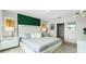 Luxurious main bedroom featuring a king-size bed and ensuite bathroom access at 3907 Botancial Court, Sanford, FL 32773