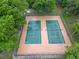 Two green tennis courts at 701 Castlewood Dr, Winter Springs, FL 32708
