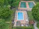 Community swimming pool with lounge chairs at 701 Castlewood Dr, Winter Springs, FL 32708