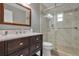 Updated bathroom with a walk-in shower and modern vanity at 701 Castlewood Dr, Winter Springs, FL 32708