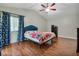 Large bedroom with wood floors and plenty of natural light at 701 Castlewood Dr, Winter Springs, FL 32708