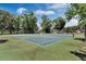 Two outdoor tennis courts at 701 Castlewood Dr, Winter Springs, FL 32708