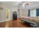 Main bedroom with ensuite bathroom and wood flooring at 701 Castlewood Dr, Winter Springs, FL 32708