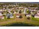 Bird's-eye view of a single-Gathering home near a lake at 4054 Marina Isle Dr, Kissimmee, FL 34746