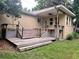 Wooden deck with stairs leading to backyard at 425 E Hillcrest St, Altamonte Springs, FL 32701