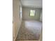 Spacious bedroom with neutral-toned walls and carpeted floors at 425 E Hillcrest St, Altamonte Springs, FL 32701
