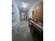 Workshop area with shelving, workbench, and water heater at 425 E Hillcrest St, Altamonte Springs, FL 32701