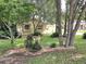 House exterior showcasing landscaping and trees at 425 E Hillcrest St, Altamonte Springs, FL 32701