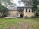 Tan house with wooden deck and backyard at 425 E Hillcrest St, Altamonte Springs, FL 32701