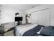Bedroom with a full-size bed and a pet cage at 781 Marion Oaks Trl, Ocala, FL 34473