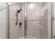 Modern shower with glass enclosure and gray tile at 781 Marion Oaks Trl, Ocala, FL 34473