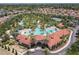 Resort-style pool with water features and a tennis court at 4791 Terrasonesta Dr, Davenport, FL 33837