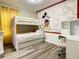 Mickey Mouse themed bedroom with bunk beds and desk at 4791 Terrasonesta Dr, Davenport, FL 33837