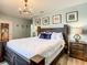 Main bedroom with Hogwarts mural and dark wood furniture at 4791 Terrasonesta Dr, Davenport, FL 33837