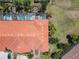Aerial view of property showing roofline and surrounding landscape at 4791 Terrasonesta Dr, Davenport, FL 33837