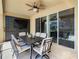 Enclosed patio with dining table and pool view at 4791 Terrasonesta Dr, Davenport, FL 33837