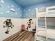 Toy Story themed bedroom with bunk beds and playful decor at 4791 Terrasonesta Dr, Davenport, FL 33837