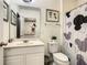 Bathroom with single vanity, toilet and shower at 4791 Terrasonesta Dr, Davenport, FL 33837