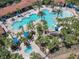 Large resort-style pool with multiple areas for swimming and relaxing at 4791 Terrasonesta Dr, Davenport, FL 33837