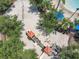 Community playground with play structures and swings at 4791 Terrasonesta Dr, Davenport, FL 33837