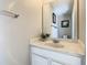 Small bathroom with vanity, toilet, and mirror at 4791 Terrasonesta Dr, Davenport, FL 33837