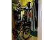 Closet with clothes, accessories, and a bicycle at 709 N Disston, Tavares, FL 32778