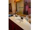 Bathroom with sink and vanity, large mirror at 709 N Disston, Tavares, FL 32778