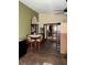 Small dining area with round table and chairs, view to another room at 709 N Disston, Tavares, FL 32778