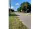 Residential street view showing quiet, tree-lined neighborhood at 709 N Disston, Tavares, FL 32778