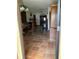 Dining room with tile floor and wooden table at 709 N Disston, Tavares, FL 32778