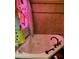 Bathroom with corner bathtub and shower curtain at 709 N Disston, Tavares, FL 32778