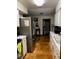 Bright kitchen features tiled floors and stainless steel appliances at 709 N Disston, Tavares, FL 32778