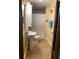 Clean bathroom with pedestal sink and shower/tub combo at 709 N Disston, Tavares, FL 32778