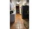 Kitchen with stainless steel appliances and pantry at 709 N Disston, Tavares, FL 32778