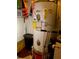 White water heater in a laundry area at 709 N Disston, Tavares, FL 32778